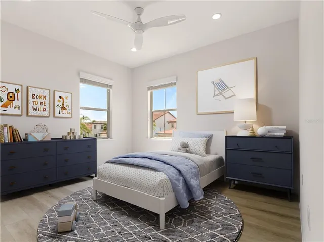 a bed room with a bed and a window