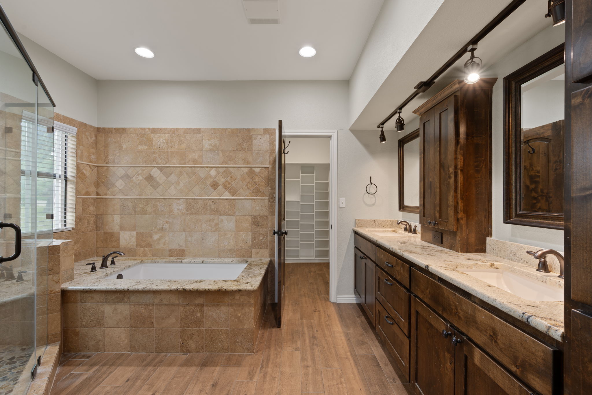330 County Road 166 Georgetown, TX 78626 - Photo 14 of 40 a bathroom with a granite countertop sink a toilet and shower