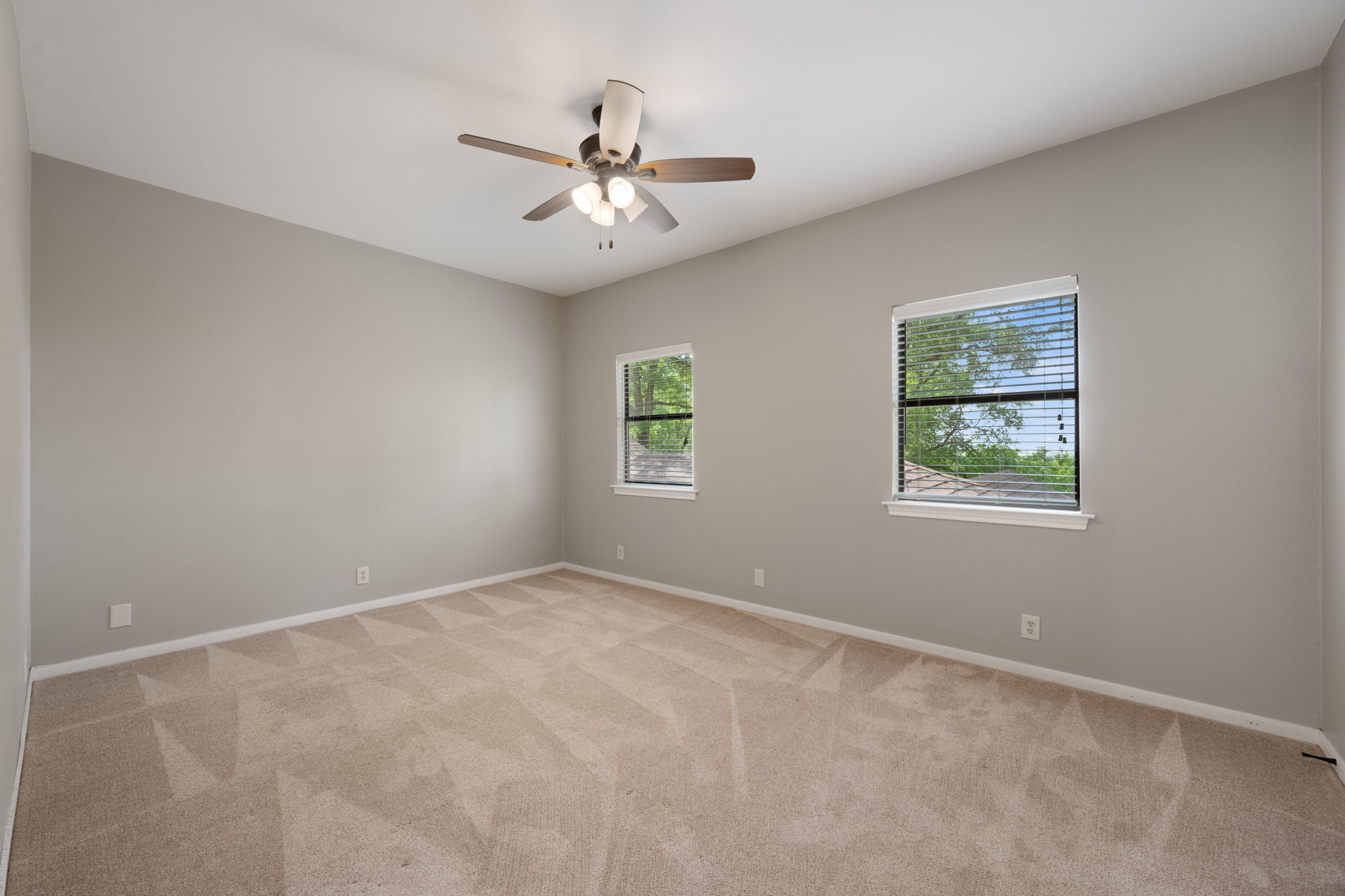 330 County Road 166 Georgetown, TX 78626 - Photo 19 of 40 an empty room with windows and fan