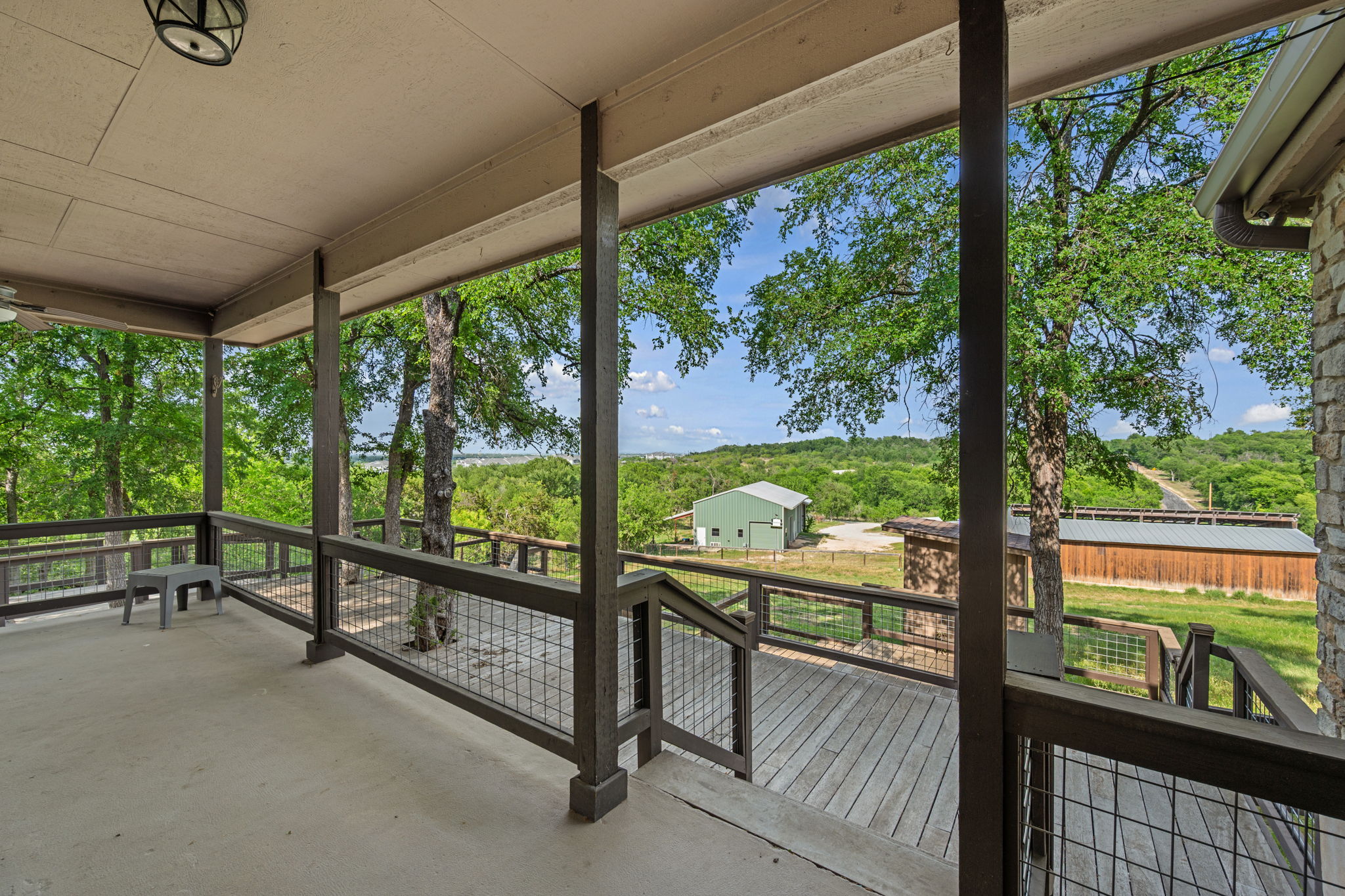 330 County Road 166 Georgetown, TX 78626 - Photo 26 of 40 a view of a porch with furniture and garden