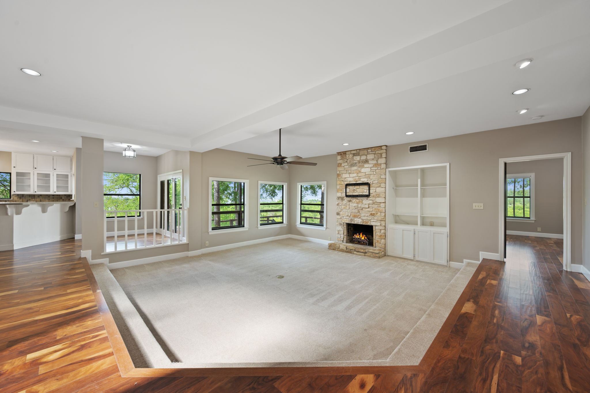 330 County Road 166 Georgetown, TX 78626 - Photo 6 of 40 a view of a livingroom with wooden floor and a fireplace