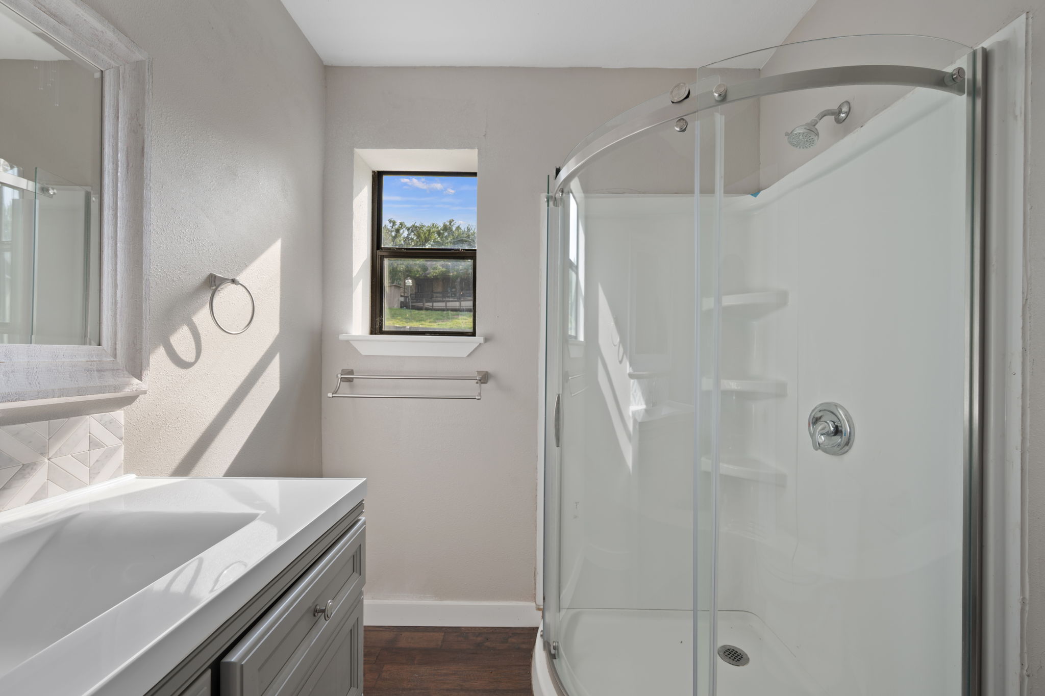 330 County Road 166 Georgetown, TX 78626 - Photo 7 of 40 a bathroom with a sink a vanity and a mirror