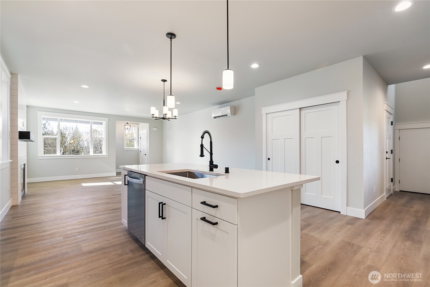 5984 Ranch Loop Ferndale, WA 98248 - Photo 11 of 37 a kitchen with a sink and wooden floor