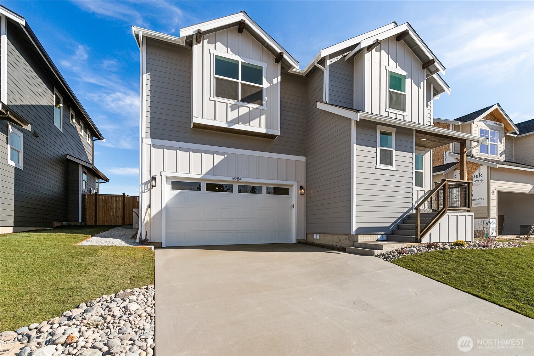 5984 Ranch Loop Ferndale, WA 98248 - Photo 2 of 37 a front view of a house with a yard