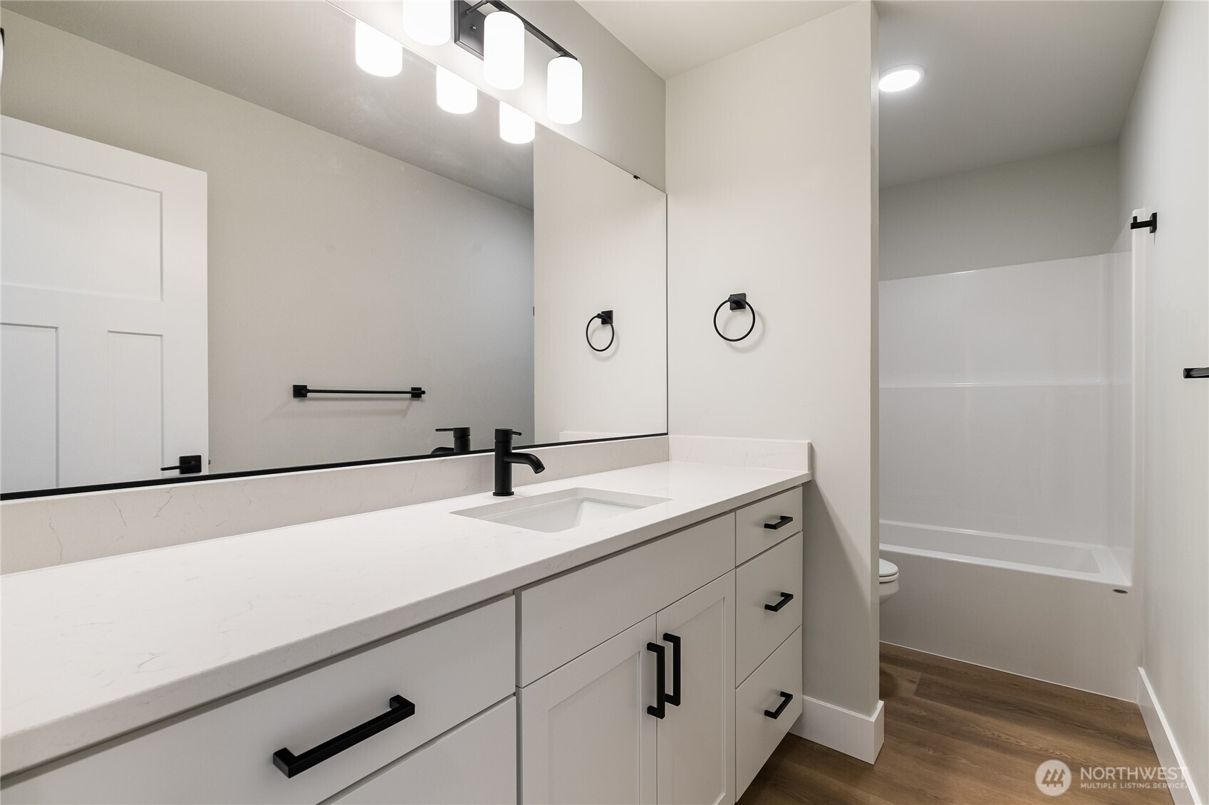 5984 Ranch Loop Ferndale, WA 98248 - Photo 21 of 37 a bathroom with a sink and a mirror
