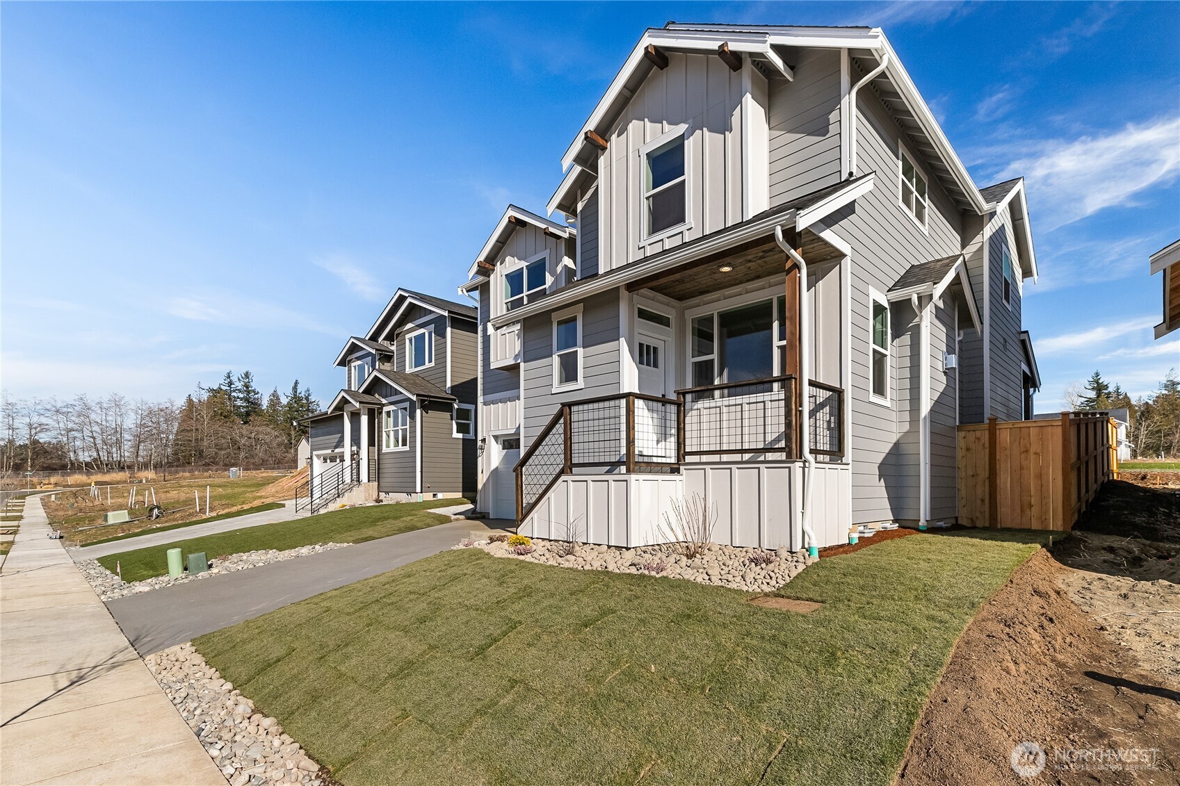 5984 Ranch Loop Ferndale, WA 98248 - Photo 3 of 37 a view of a house with a roof deck