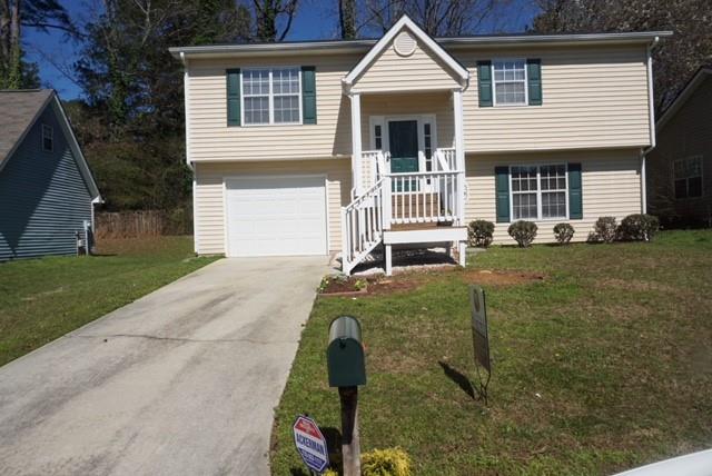 3424 Peachcrest Trace Decatur, GA 30032 - Photo 1 of 1 front view of a house with a yard