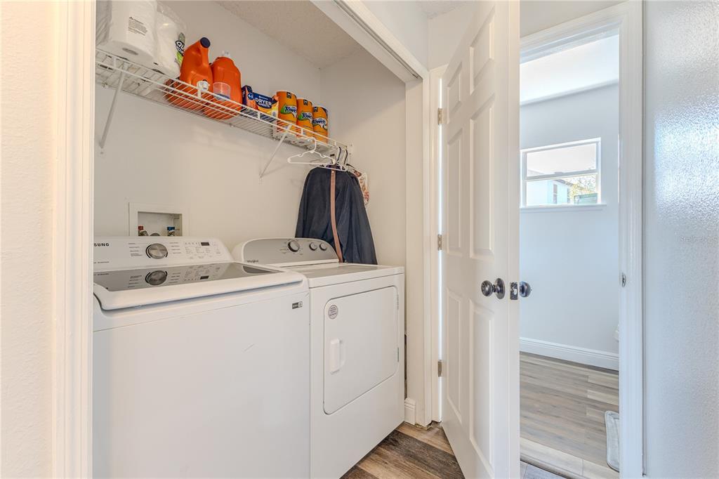 5437 Freeport Drive Spring Hill, FL 34606 - Photo 22 of 34 a utility room with dryer and washer