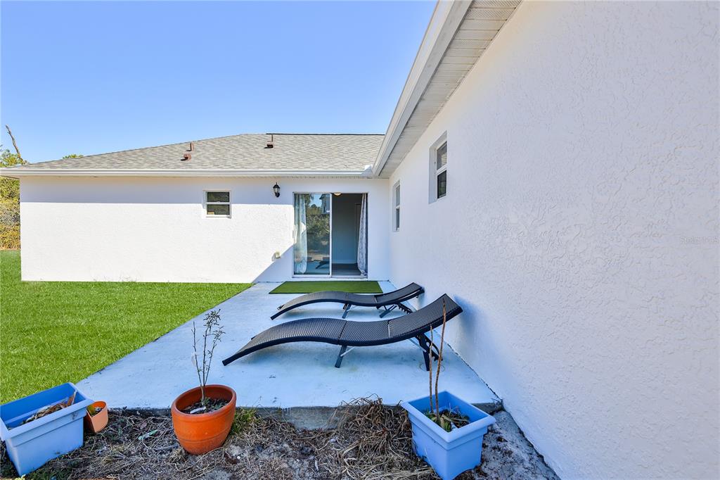 5437 Freeport Drive Spring Hill, FL 34606 - Photo 28 of 34 a room with pool table and chairs