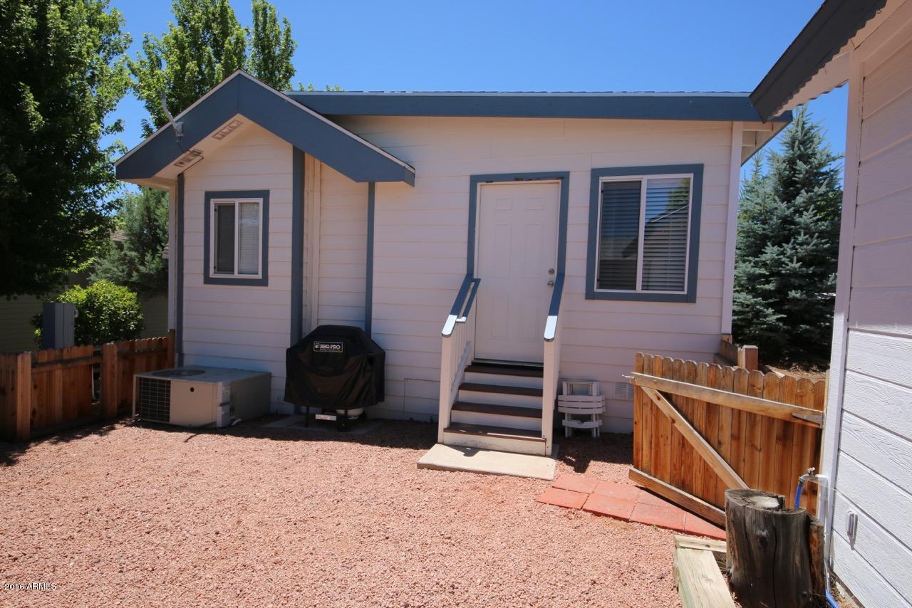 2216 Rodeo Road Overgaard, AZ 85933 - Photo 26 of 41 Back of Home