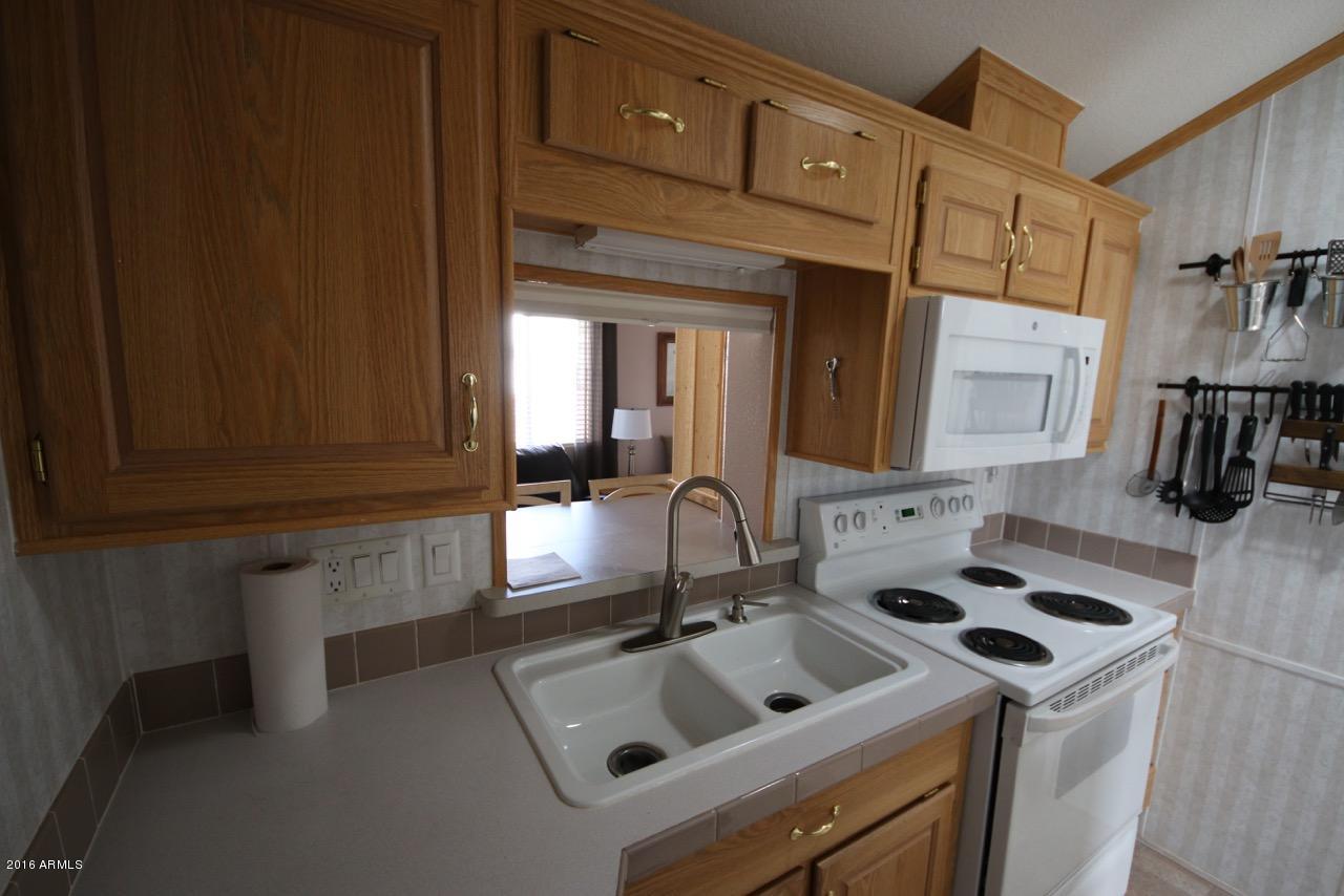 2216 Rodeo Road Overgaard, AZ 85933 - Photo 7 of 41 Kitchen Pass Through 2