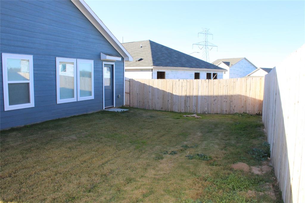 4048 Arklow Street Crowley, TX 76036 - Photo 12 of 13 a view of a house with a yard