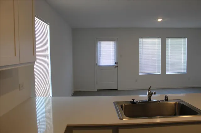 a bathroom with a sink and a bathtub