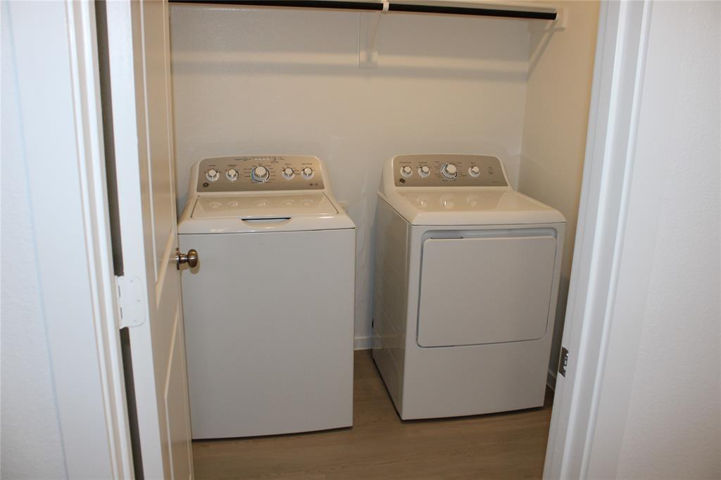 4048 Arklow Street Crowley, TX 76036 - Photo 9 of 13 a utility room with dryer and washer