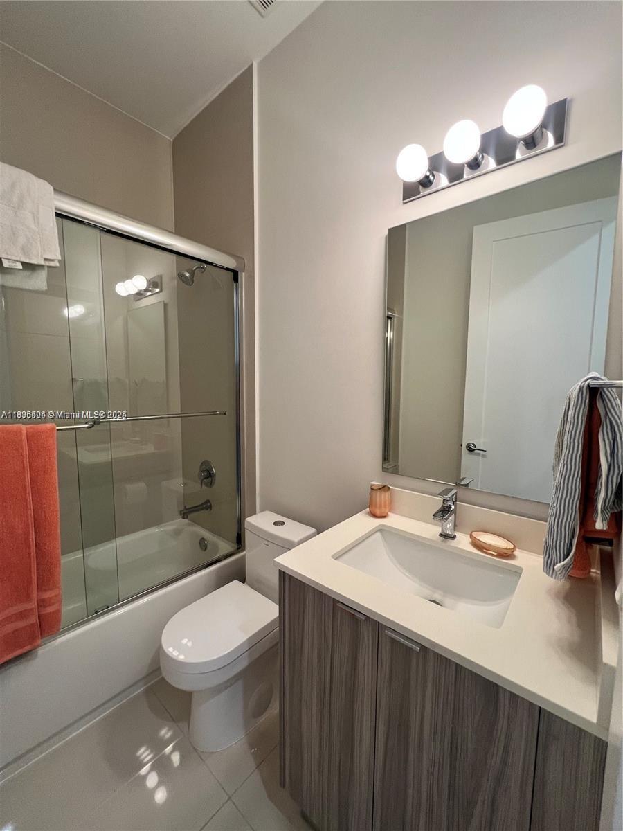 Kendall Miami, FL 33186 - Photo 11 of 30 a bathroom with a sink a toilet and shower