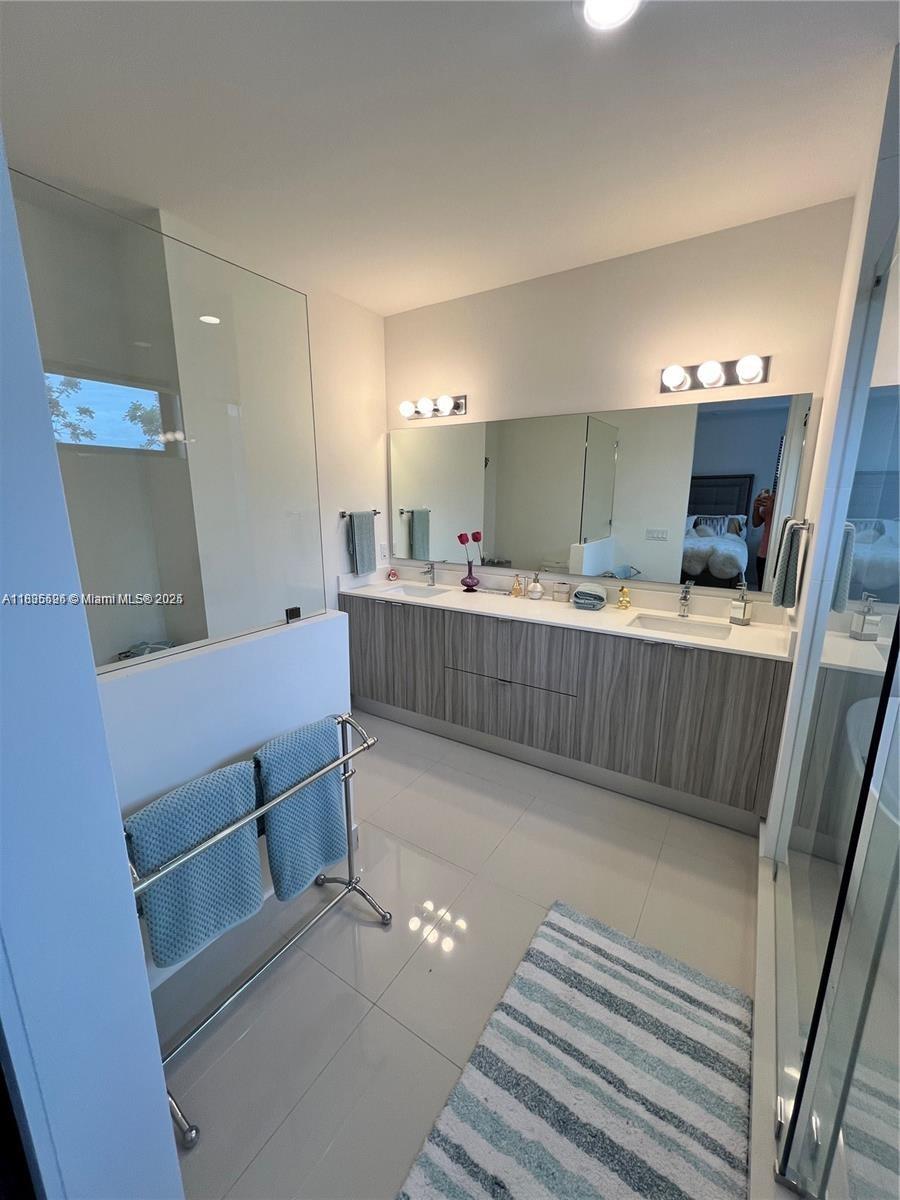Kendall Miami, FL 33186 - Photo 18 of 30 a room with a chair and flat screen tv