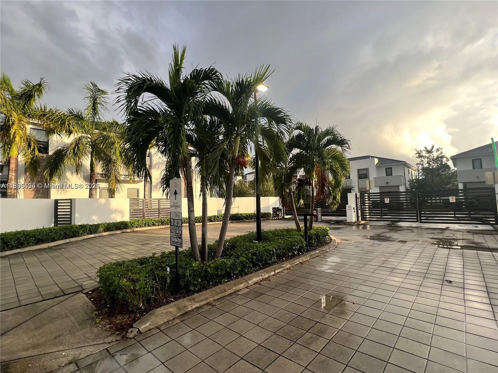 Kendall Miami, FL 33186 - Photo 29 of 30 a view of a yard and car parked