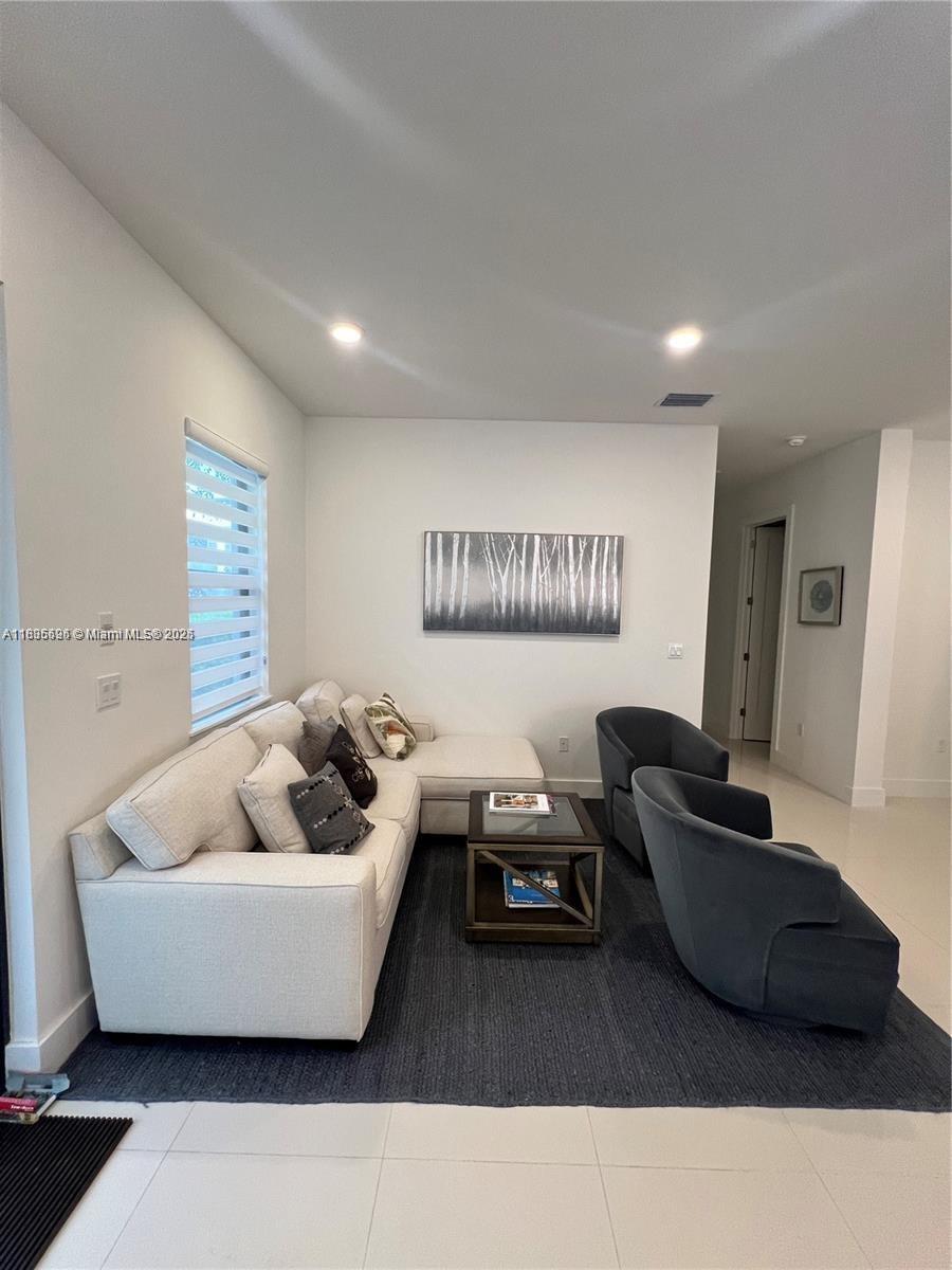 Kendall Miami, FL 33186 - Photo 5 of 30 a living room with furniture and a couch