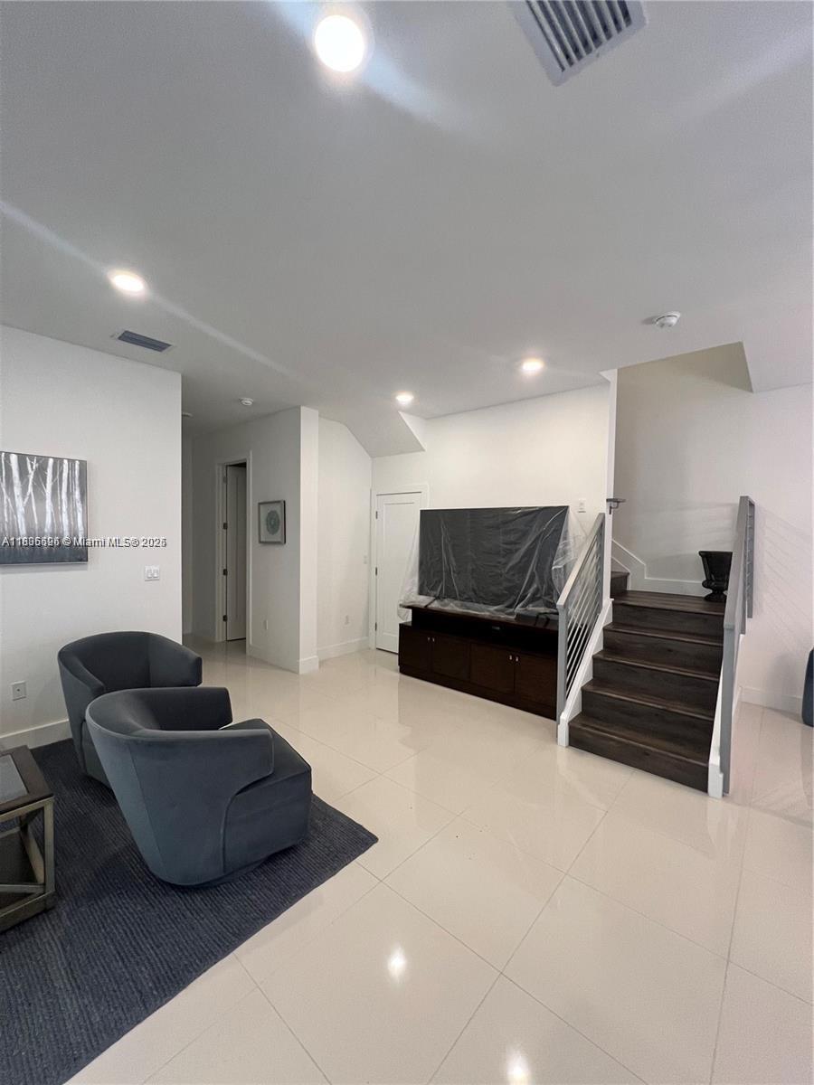 Kendall Miami, FL 33186 - Photo 6 of 30 a living room with furniture and a potted plant