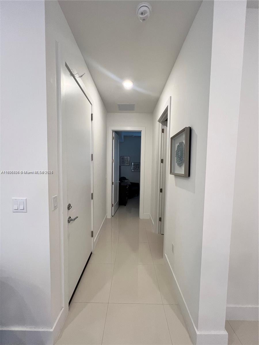 Kendall Miami, FL 33186 - Photo 7 of 30 a view of a hallway with an entryway
