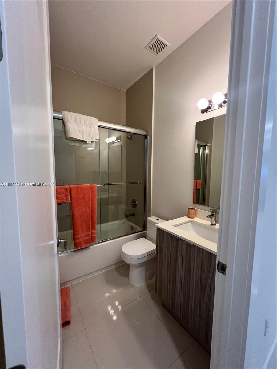 Kendall Miami, FL 33186 - Photo 10 of 30 a bathroom with a sink a toilet and shower