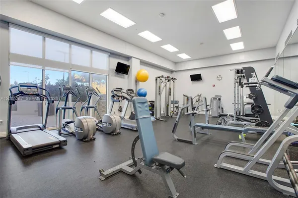 a view of a room with gym equipment
