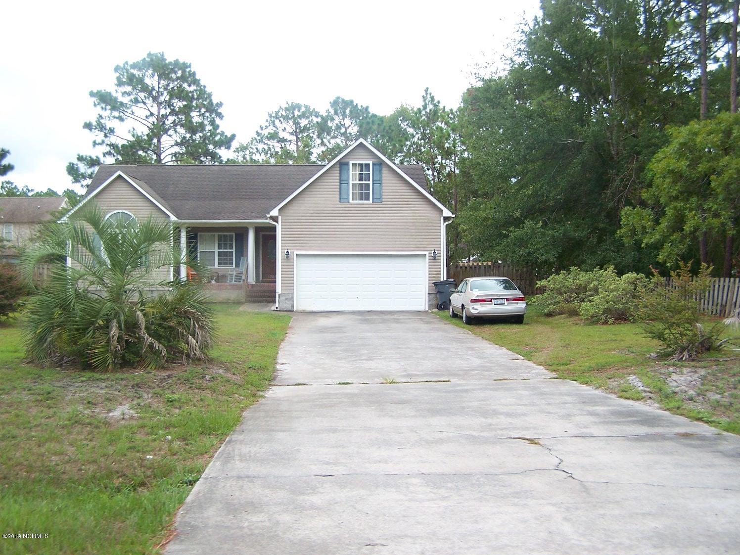 1354 East Boiling Spring Road Southport, NC 28461 - Photo 1 of 1 front of house