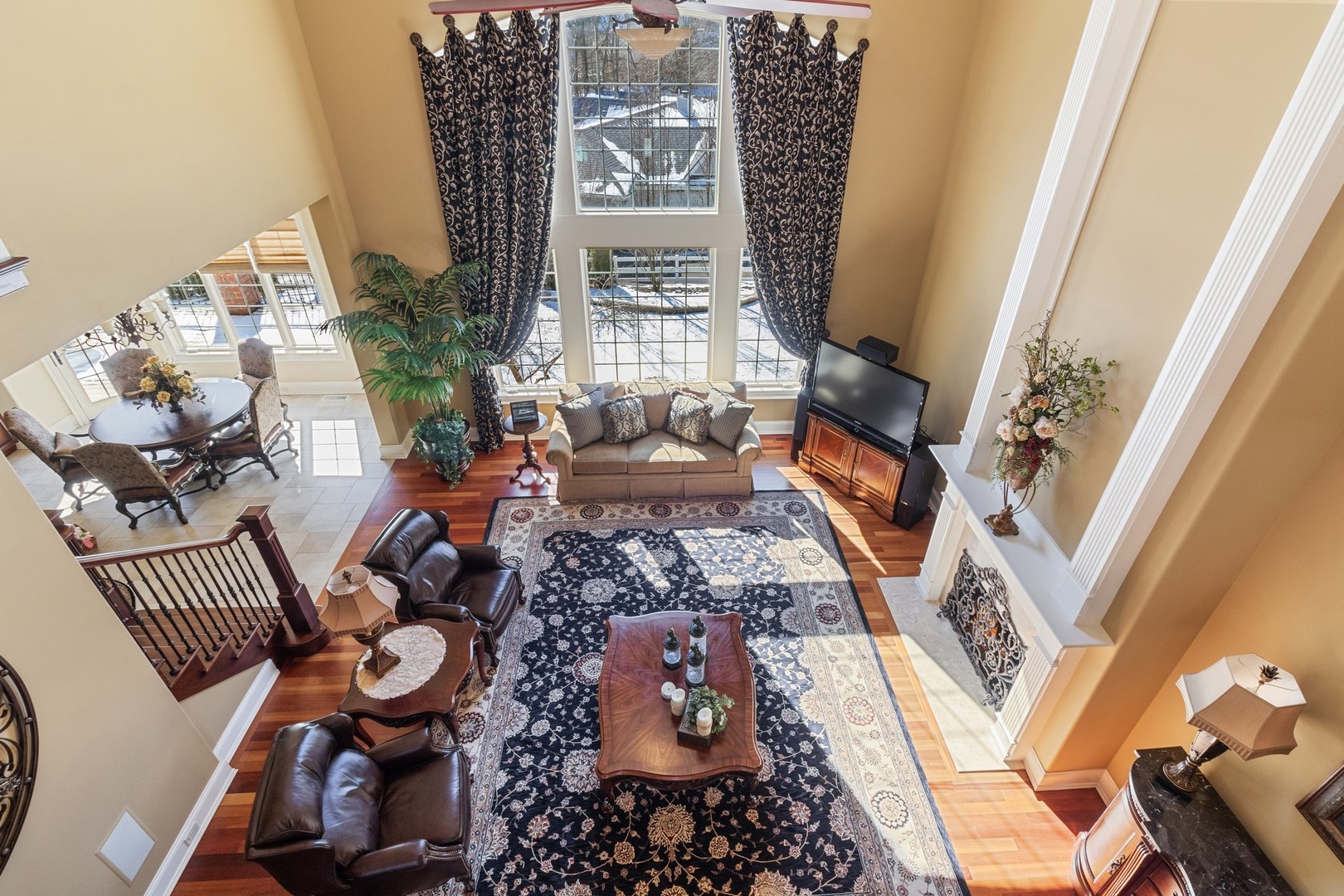 10911 Royal Oaks Lane Orland Park, IL 60467 - Photo 15 of 29 a living room with furniture and a floor to ceiling window