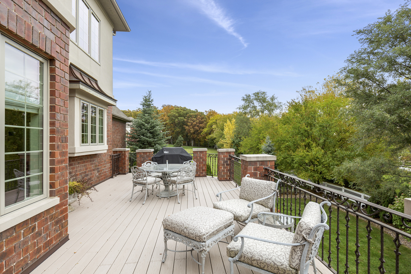 10911 Royal Oaks Lane Orland Park, IL 60467 - Photo 28 of 29 a view of a patio with couches chairs and wooden floor