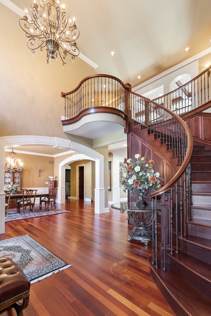 10911 Royal Oaks Lane Orland Park, IL 60467 - Photo 4 of 29 a view of hall with staircase