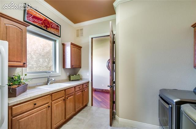4516 Seton Hall Road Colorado Springs, CO 80918 - Photo 29 of 36 Laundry/Mud room.