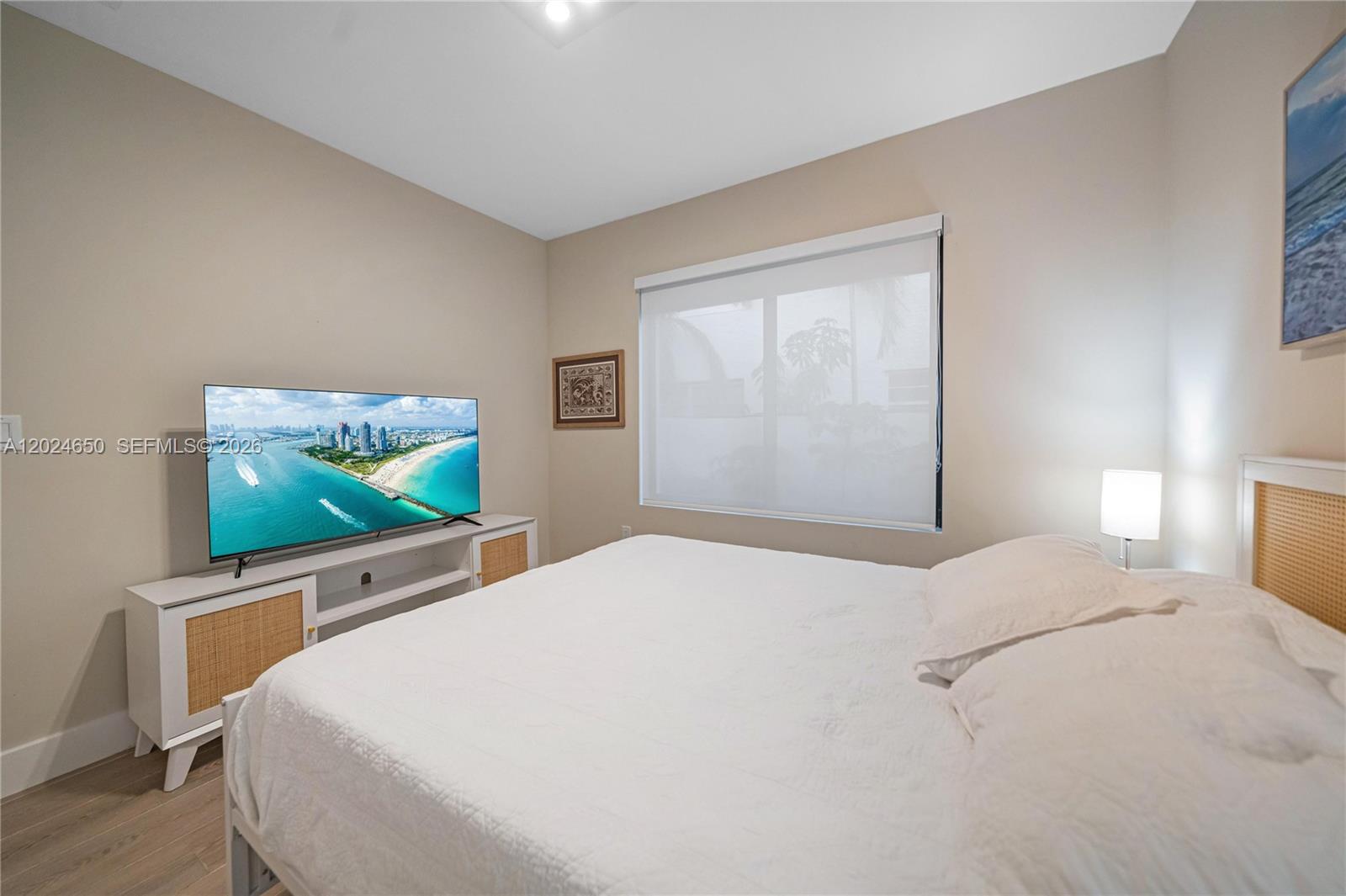 1663 Southwest 13th Street Miami, FL 33145 - Photo 42 of 112 a bedroom with a bed and a flat screen tv