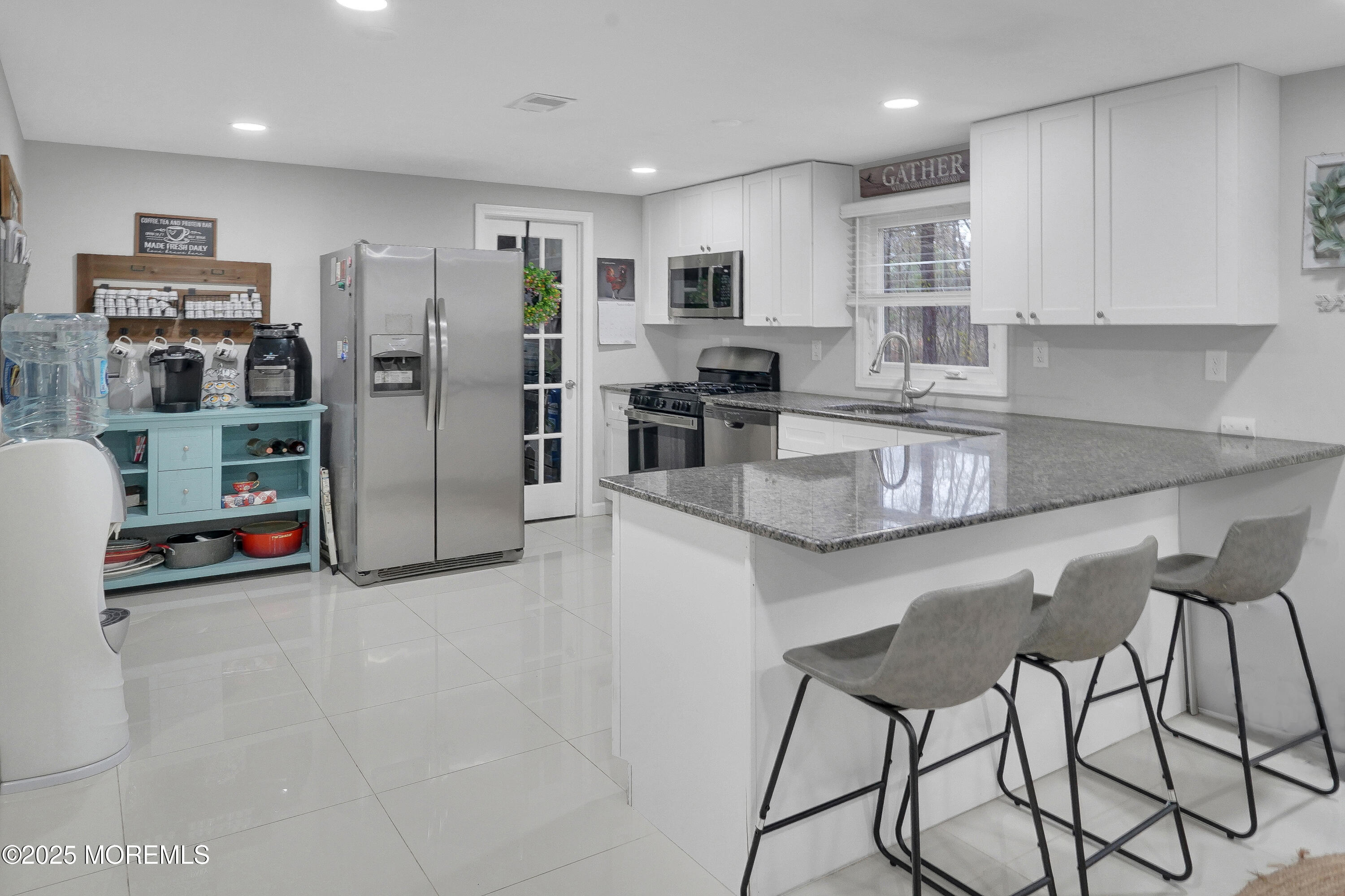 336 Jackson Mills Road Jackson, NJ 08527 - Photo 13 of 45 a kitchen with stainless steel appliances granite countertop a refrigerator and a stove top oven