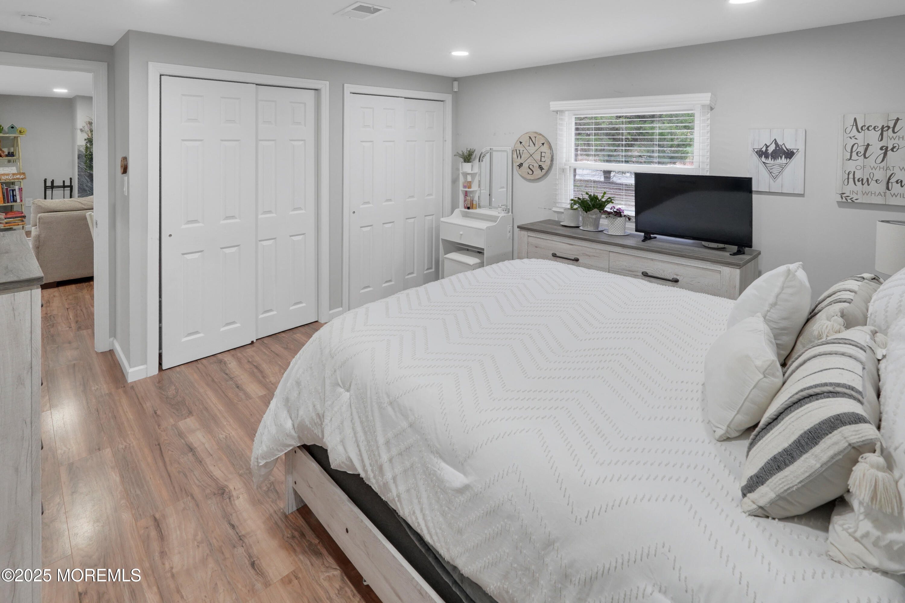336 Jackson Mills Road Jackson, NJ 08527 - Photo 18 of 45 a bedroom with a bed and wooden floor