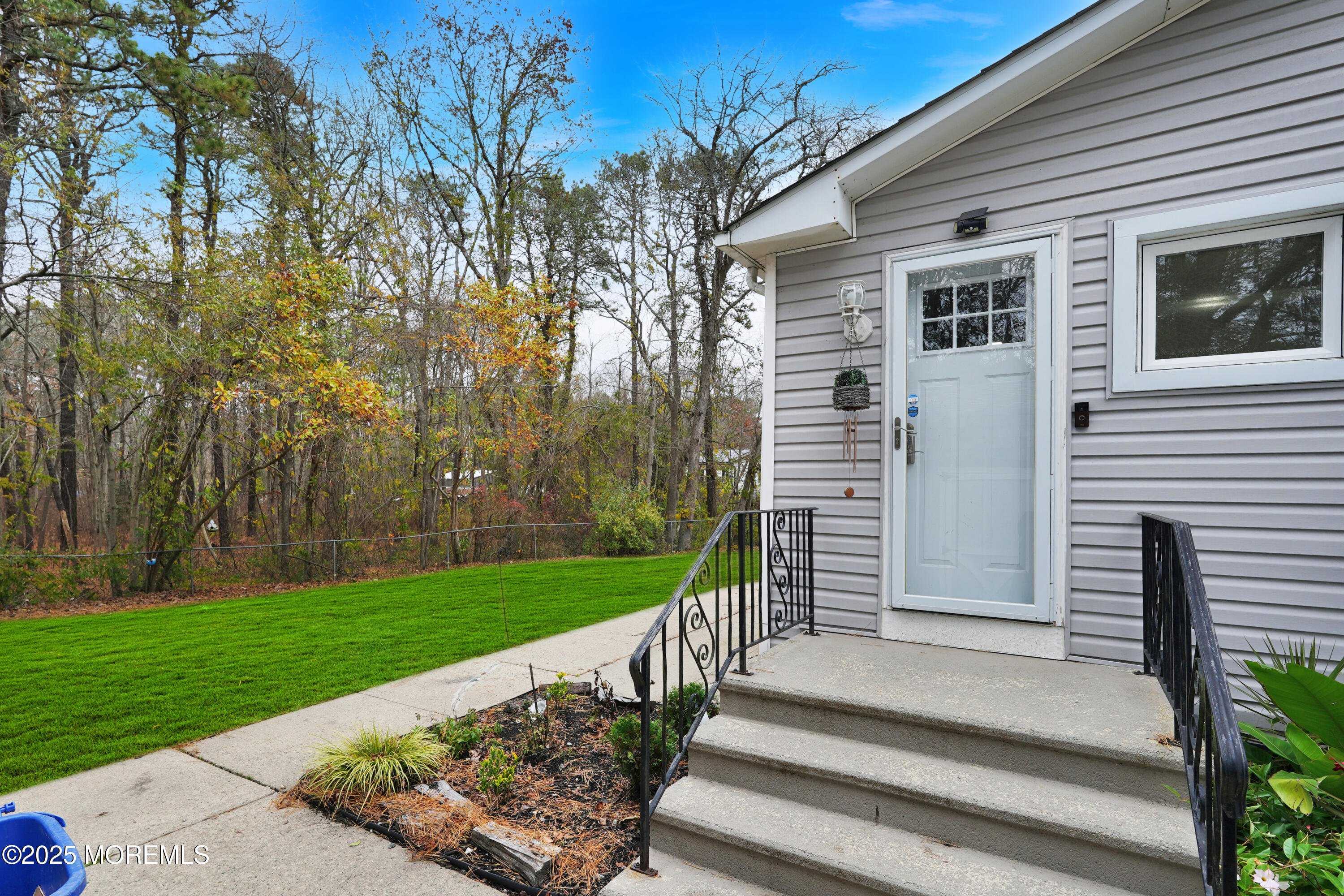 336 Jackson Mills Road Jackson, NJ 08527 - Photo 25 of 45 a view of a porch with a yard