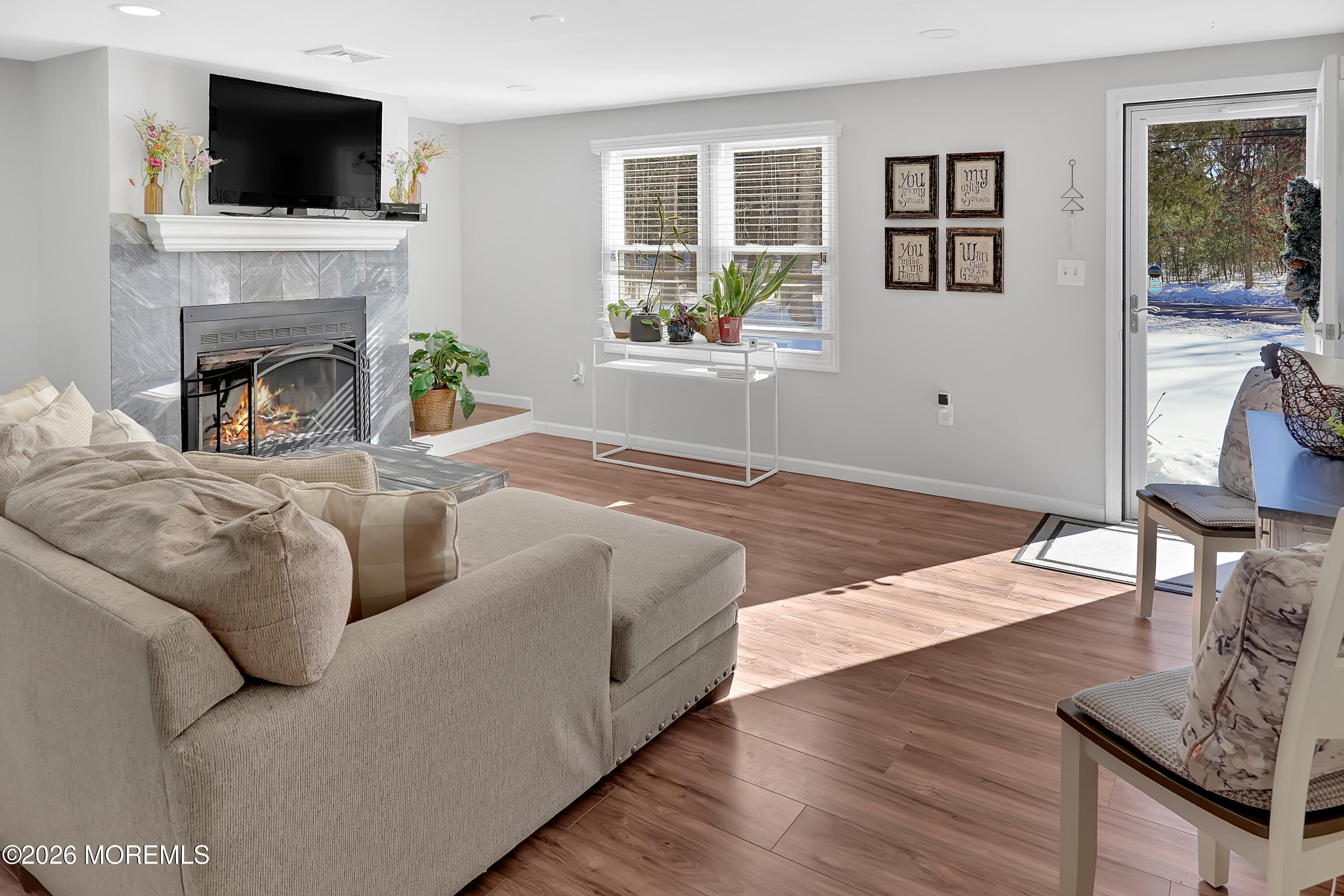 336 Jackson Mills Road Jackson, NJ 08527 - Photo 6 of 45 a living room with furniture fireplace and flat screen tv