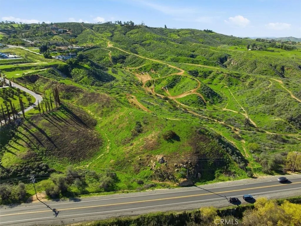 0 Arbor Creek Riverside, CA 92504 - Photo 3 of 11 a view of a lush green field with lots of trees in the background