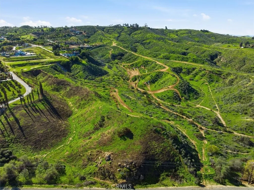 0 Arbor Creek Riverside, CA 92504 - Photo 6 of 11 a view of a lush green forest with houses in the back