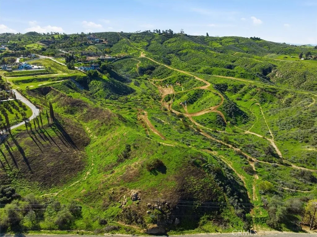 0 Arbor Creek Riverside, CA 92504 - Photo 6 of 11 a view of a lush green forest with houses in the back