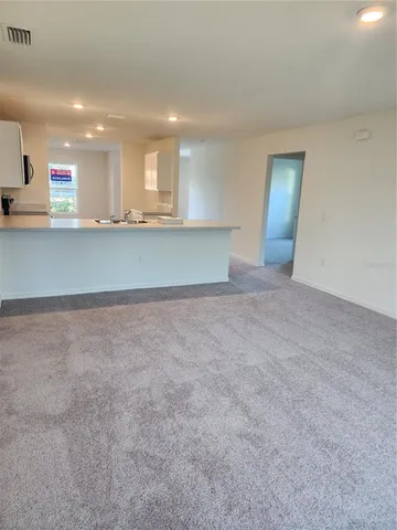 a bathroom with a sink and shower
