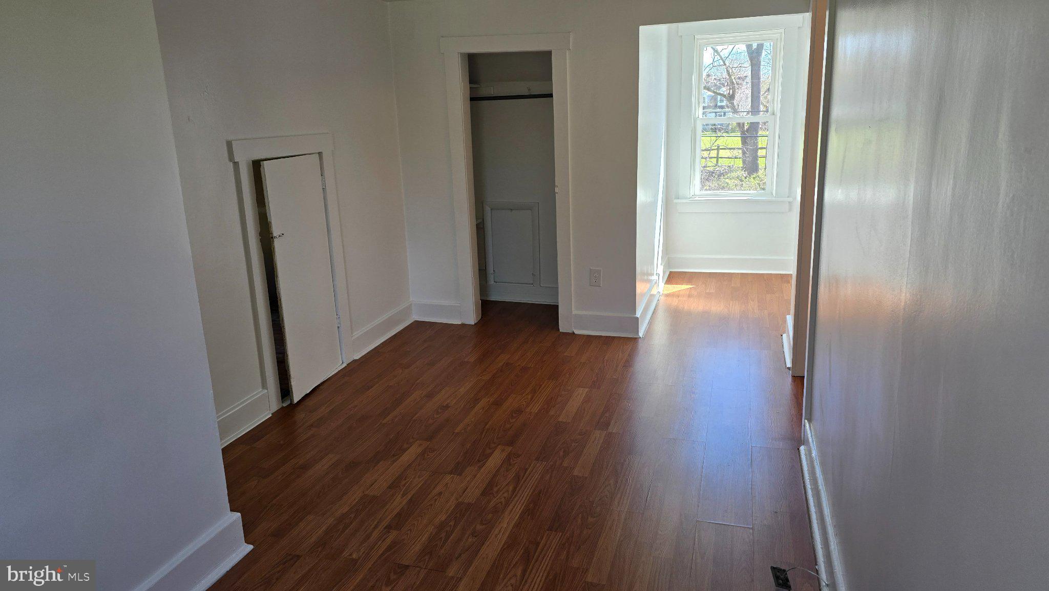 1233 New London Road Landenberg, PA 19350 - Photo 17 of 37 a view of a hallway with wooden floor