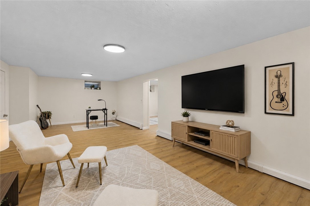 461 River Road Lincoln, RI 02865 - Photo 25 of 32 Finished lower level offers flex space for entertainment, home office, rec room