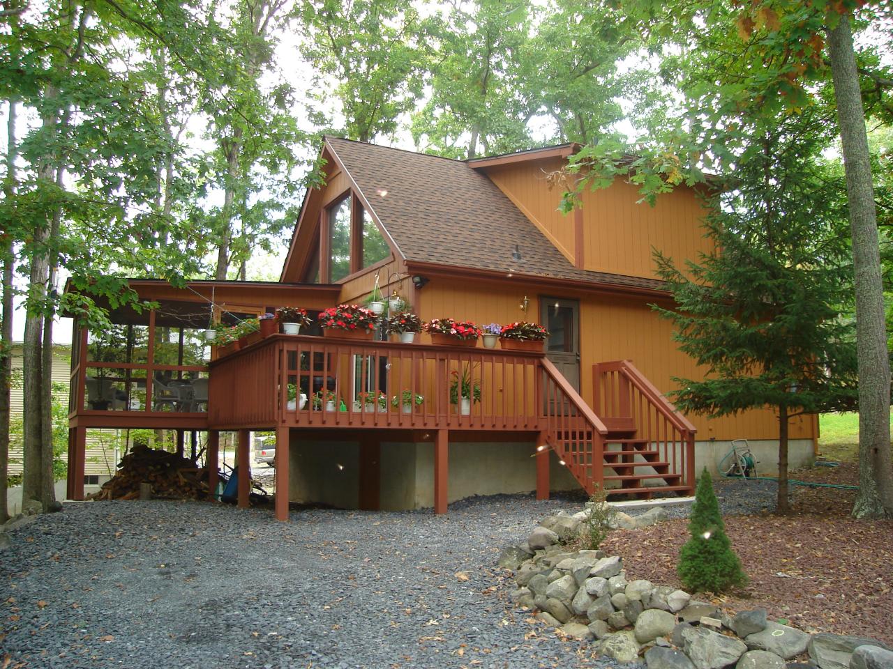 967 Decker Road Bushkill, PA 18324 - Photo 1 of 12 a view of a house with a yard balcony and tree