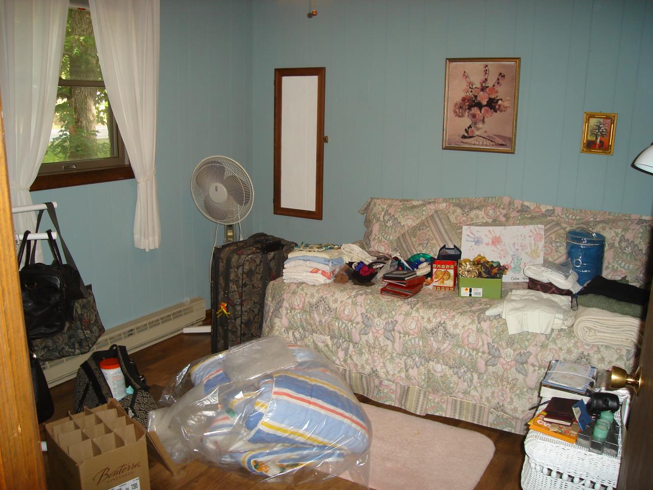 967 Decker Road Bushkill, PA 18324 - Photo 7 of 12 a bedroom with a bed and wooden floor