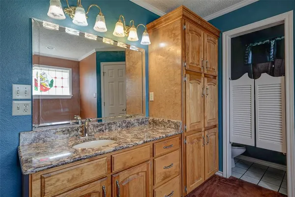 a view of a bedroom with natural light