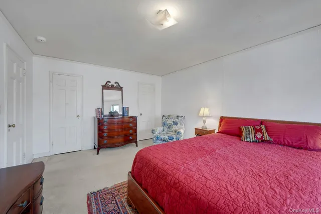a bathroom with a sink toilet and a mirror