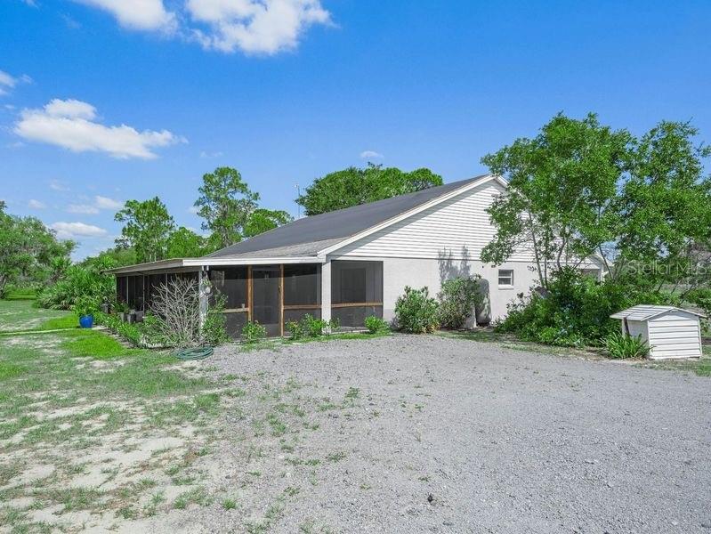 1850 South Lake Reedy Boulevard Frostproof, FL 33843 - Photo 2 of 36 a view of a house with a yard