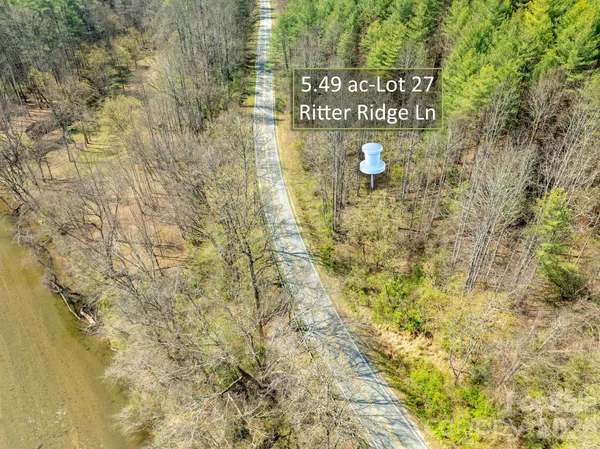 a sign broad in front of a blue wall