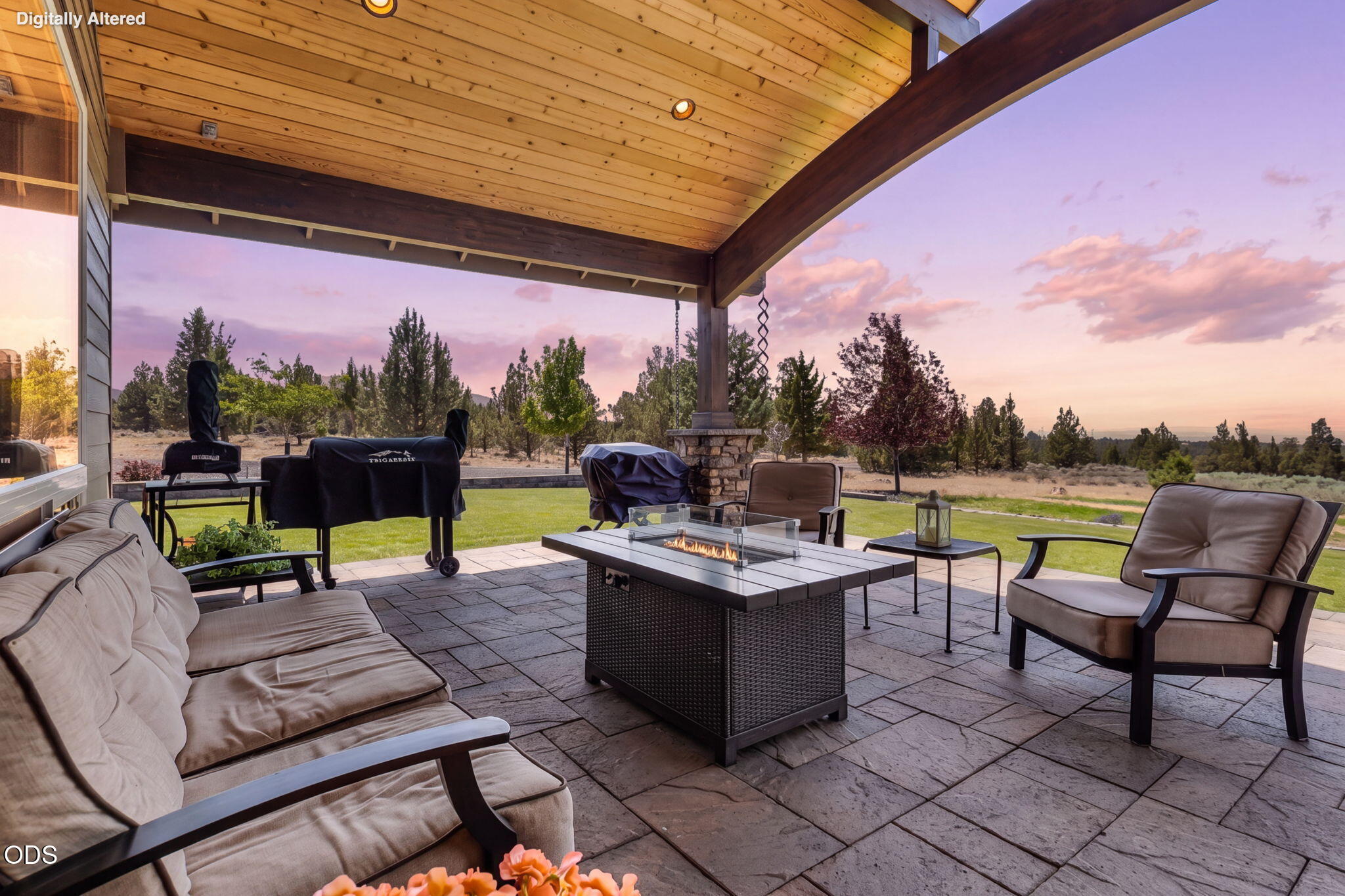 13601 Southwest Harrison Way Powell Butte, OR 97753 - Photo 5 of 81 a view of a patio with a dining table and chairs with a patio
