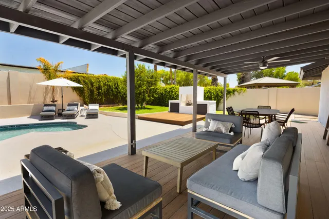 a outdoor space with patio lots of furniture